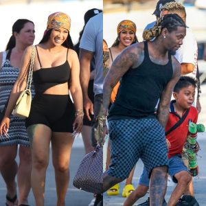 Cardi B shows off her cleavage in a skimpy ensemble as she and hubby Offset continue to enjoy family getaway to Mexico -News