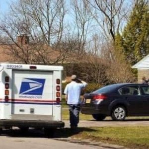 Heartwarming Moment Captured: USPS Driver Pays Tribute to Flag